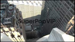 Construction workers install final section of spire atop ...
