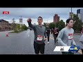 Sean Streicher checks in during the 5K race