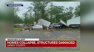 Homes collapse, structures damaged