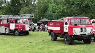 Emergency Vehicles Leaving After Saues 100-Year Volunteer Firefighting Celebration