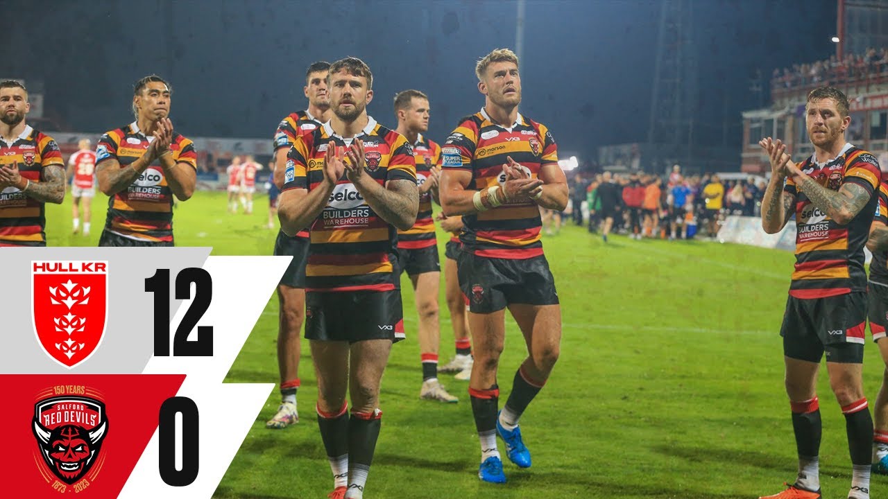 Salford Red Devils celebrate their try during the Betfred