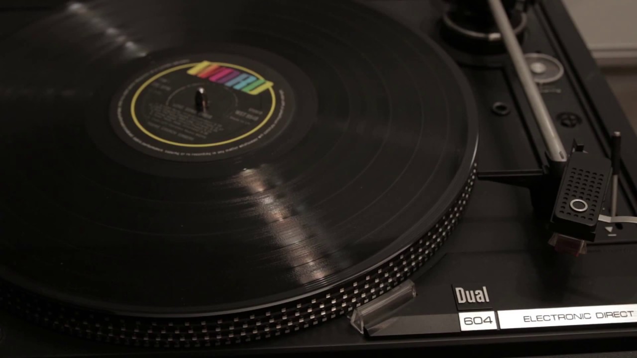 А man plays a vinyl record | FREE STOCK VIDEO FOOTAGE