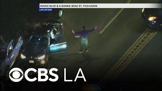 Robbery suspect pretends to surrender before continuing police pursuit in downtown LA
