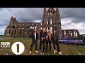 "I thought this was a secret!"  Greg James talks to Coldplay at Whitby Abbey