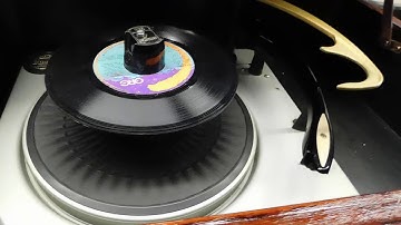 Magnavox Micromatic record changer demonstration playing a stack of 45