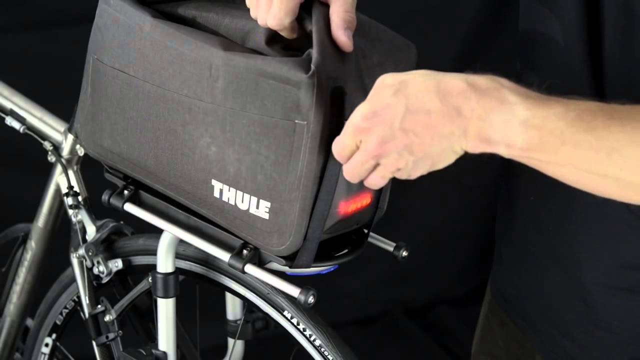 Thule Pack 'n Pedal Trunk Bag | roofracks.co.uk - YouTube