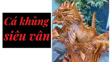 Báo giá tượng cá chép hóa rồng gỗ hương Gia Lai khủng.