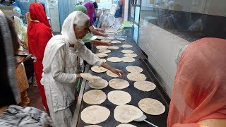 100s of Free Indian Meals served up Daily at Southall Temple 'Sri Guru Singh Sabha Gurdwara' London.