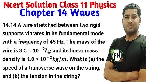 14.14 A wire stretched between two rigid supports vibrates in its fundamental mode with a frequency