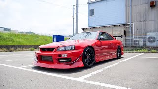 内装すべて本革張替！！張り出しエアロの赤いR34。