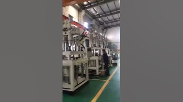 FOMTEC VERTICAL INJECTION MOLDING MACHINE IN CUSTOMER FACTORY