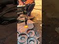 cutting metal circles from a large steel sheet using a semi automatic gas cutting machine closely