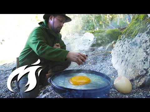 Watch: Man cooks, eats giant ostrich egg in European forest Watch: Man cooks, eats giant ostrich egg in European forest