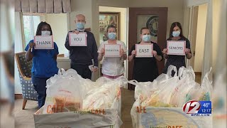 Cranston East seniors use prom money to donate food to assisted living center
