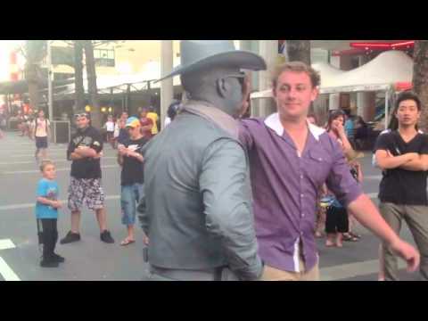 Guy Gets Punched By Street Performer! Pow Right In The Kisser!