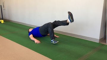 Glute Bridge With Leg Kicks Exercise