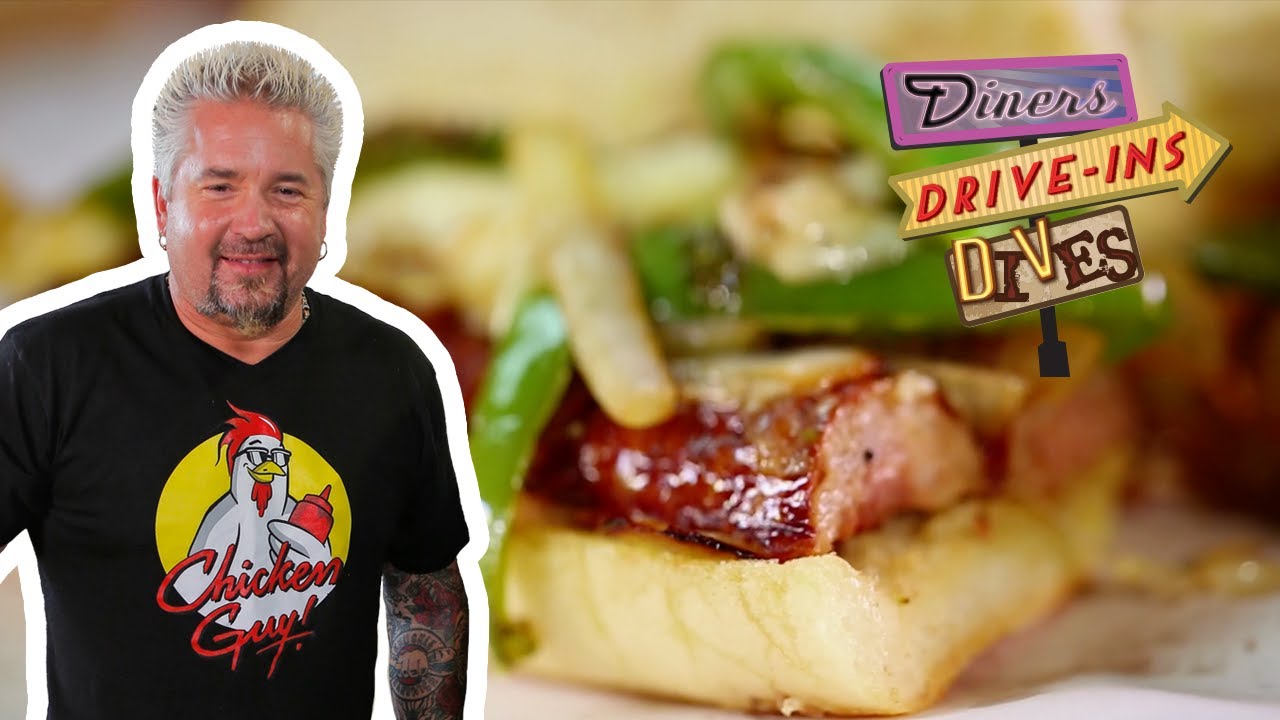 Guy Fieri Tries a House-Made Jerky and Sausage Sandwich | Diners, Drive-Ins and Dives | Food Network