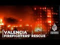 Valencia Firefighters Rescue Trapped Residents from Wind-Fanned Blaze, Investigation Underway