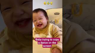 Cute baby trying to copy a dance on the screen #cute #cutebaby #todlers #cutebaby