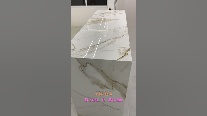 Península em Porcelanato Calacata Gold