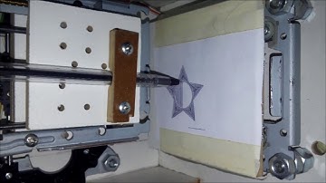 mini cnc router feito com drivers de cds e dvds pintando uma estrela...cnc machine... fresadora