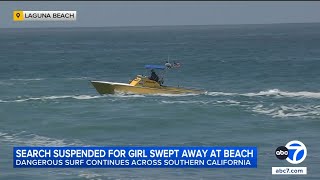 Coast Guard suspends search for girl swept out to sea by powerful surf