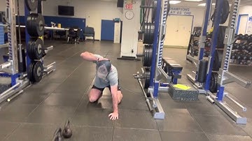 Quadruped t-spine rotation with band