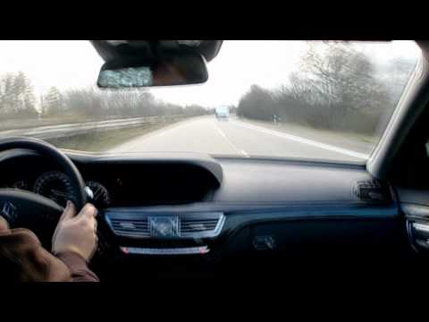 Driving fast on the Autobahn in a Mercedes S-Class...