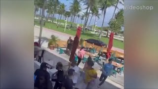 Chaotic scene on Miami Beach as fleeing car has people running for cover