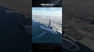 Indigo Airbus A320 flying over Dubai