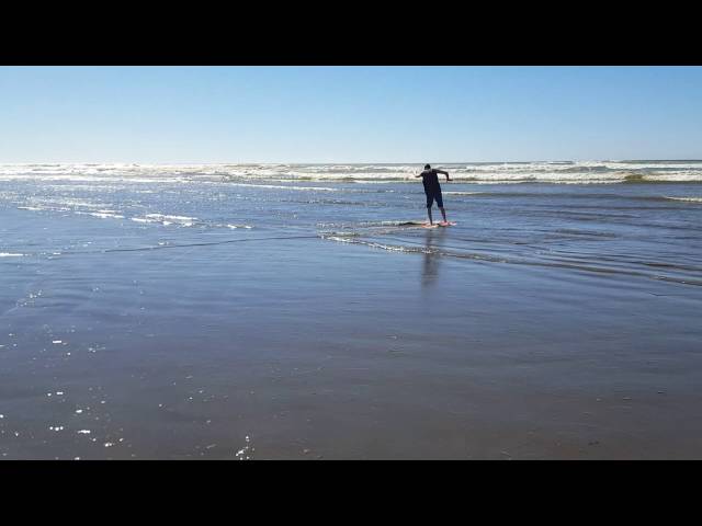 Roadschool life | Boys skim boarding at ocean shores