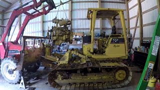 Taking the engine out of the dozer to start repairs cat d3c lgp hystat