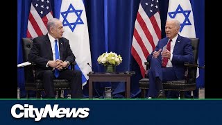 Biden visits Israel and delivers warning