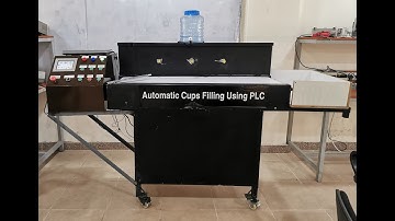 Bottle filling machine using Allen Bradley PLC & Proface HMI