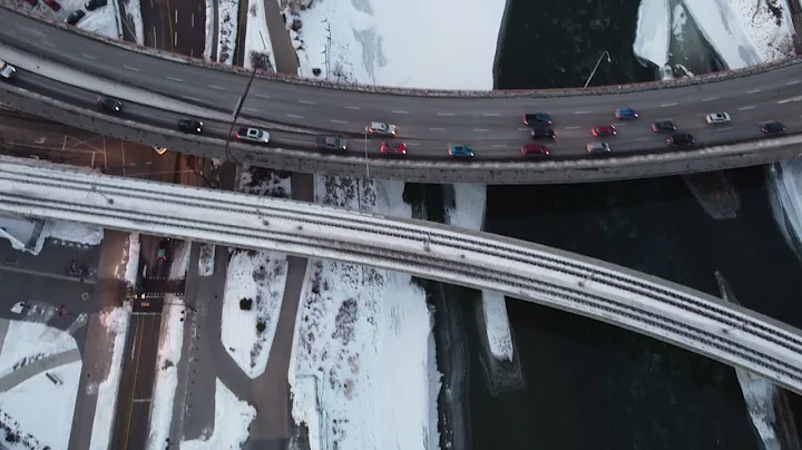 Flying over the bow river in the middle of winter ...