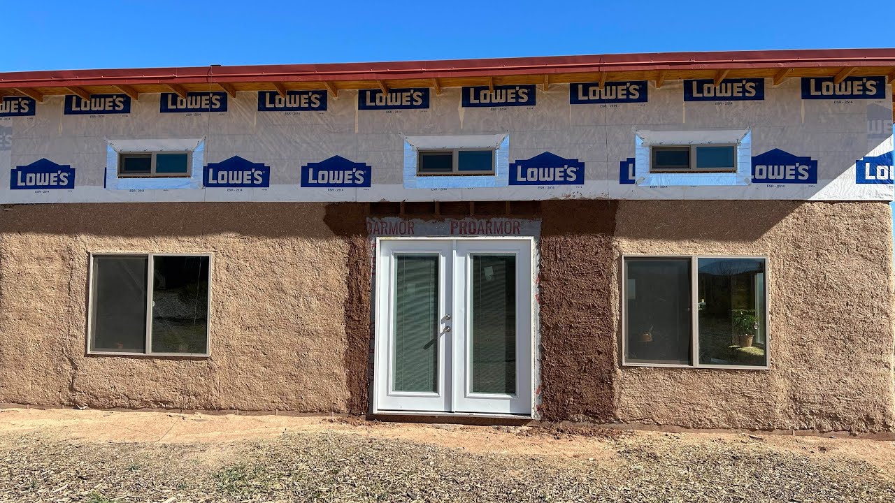 Putting Up Siding on Our Strawbale House YouTube