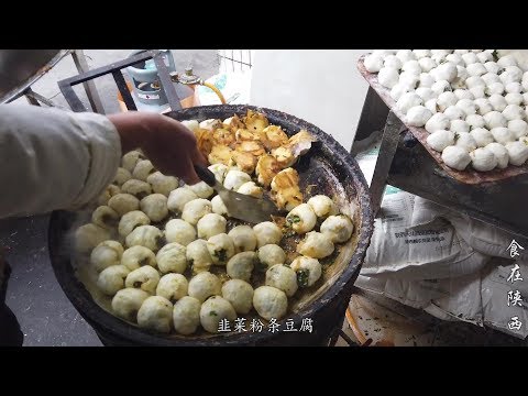 河南夫妻20年陕西卖水煎包，一天工作14个小时，全是回头客