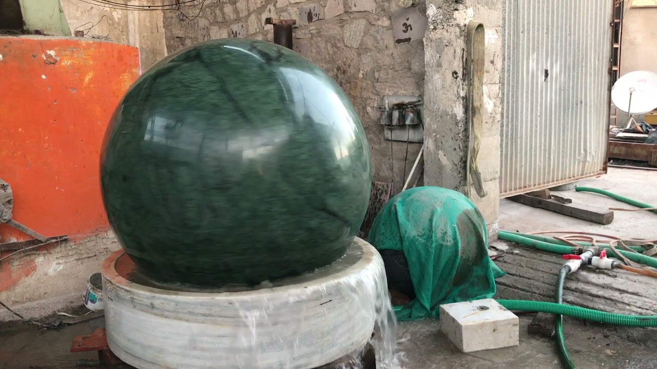 Piera galleggiante, Fountain with a marble Kugel ball ,Floating marble sphere in italy