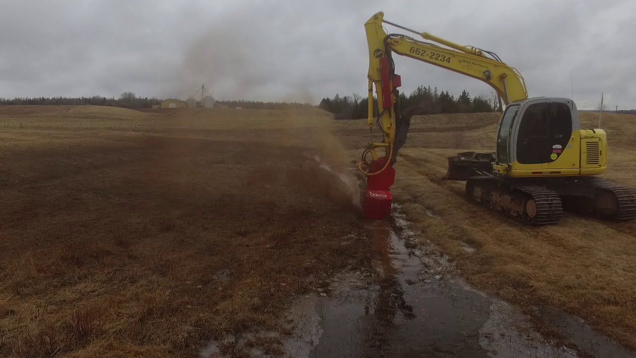 Rotary Attachment For Excavator Makes Ditch Maintenance More Efficient