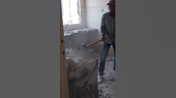 The process of manually demolishing a building using a hammer #building #tools