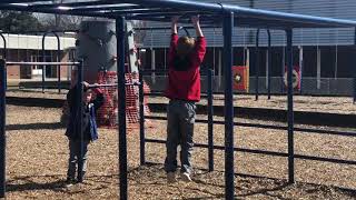 5 years old on monkey bars