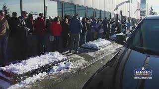 Lines out the door, Alaskans set record for early voting