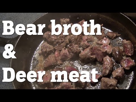 Adding venison to a black bear bone broth for a stew - Big Wild Year