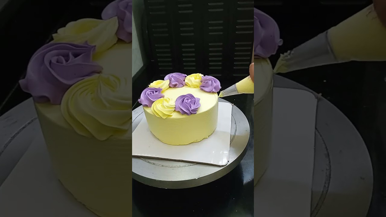 Yellow and purple color cake design in@ cake andshake