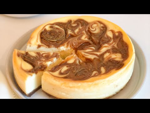 تشيزكيك-اللوتس-بالفرن-مزخرف-كريمي-و-لذيذ-لا-يفوتكم-/cheesecake-cuit-au-lotus-marbré-beau-et-top-bon