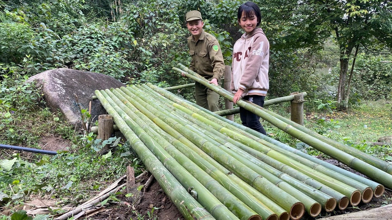 Poor Orphan received help from a police officer to build a new handwashing area using bamboo.