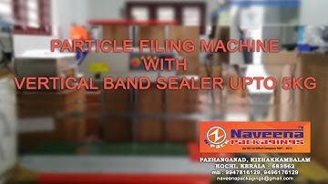 PARTICLE FILLING MACHINE WITH VERTICAL BAND SEALER Naveena packagings(N-PACK)