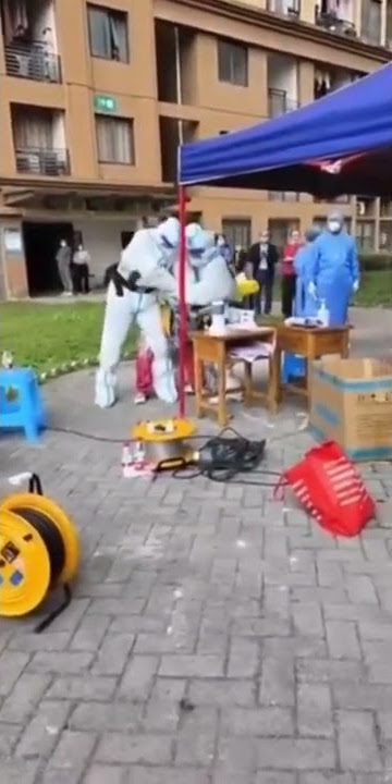 Forced anal sampling for covid in China