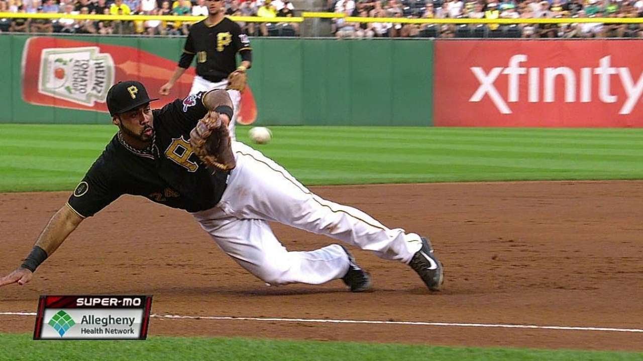 ARI@PIT: Alvarez dives, throws to first for the out