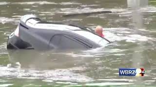 Firefighters Swim Through Flash Flood, Save Driver
